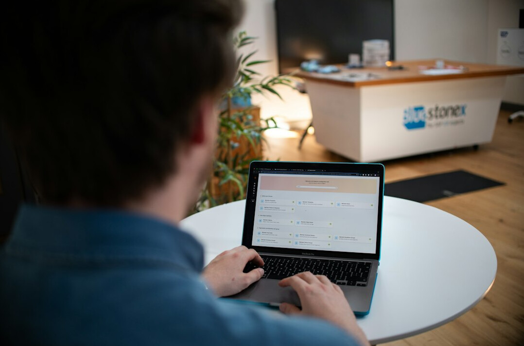 croatian student coding on laptop