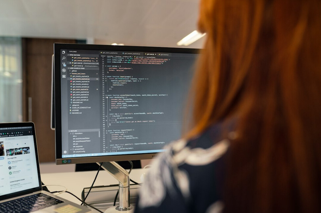 beginner programmer at computer